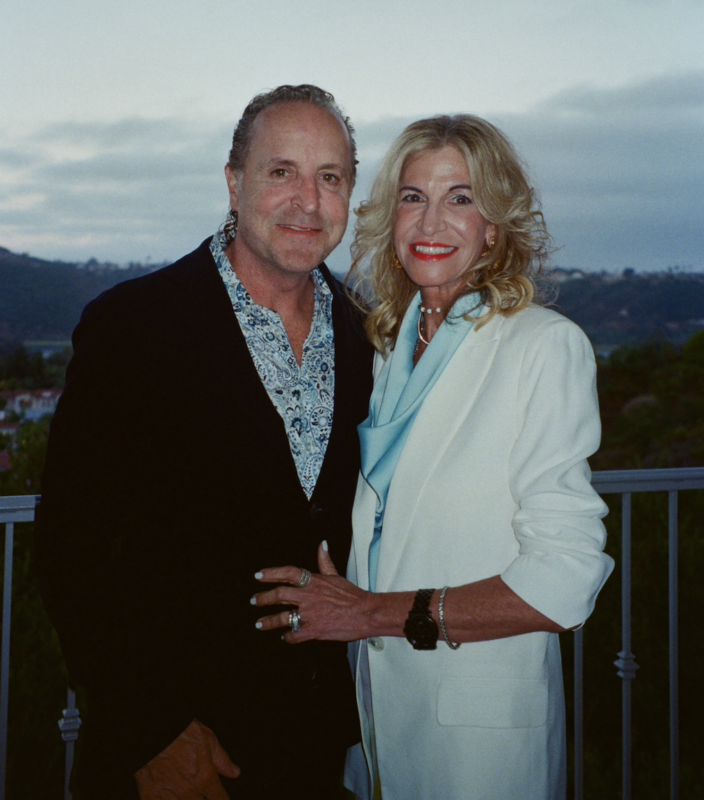 Rachel's parents dressed up at an evening party