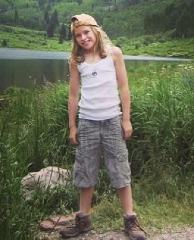 Young Rachel outdoors on a family trip